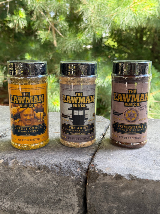 Limited inventory of The Lawman Rub Co BBQ seasonings including lemon pepper seasoning, butter garlic seasoning, and steak and wild game seasoning before discontinuation.