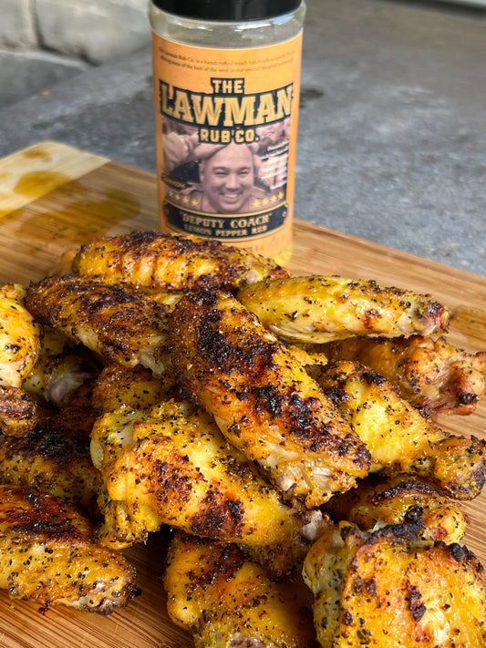 Crispy chicken wings tossed in Deputy Coach Lemon Pepper BBQ Seasoning – the ultimate show-stopper for game day BBQ